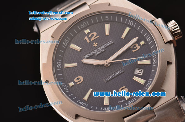 Vacheron Constantin Overseas Swiss ETA 2836 Automatic Steel Case with Blue Dial Titanium Bezel and Stick Markers - Click Image to Close